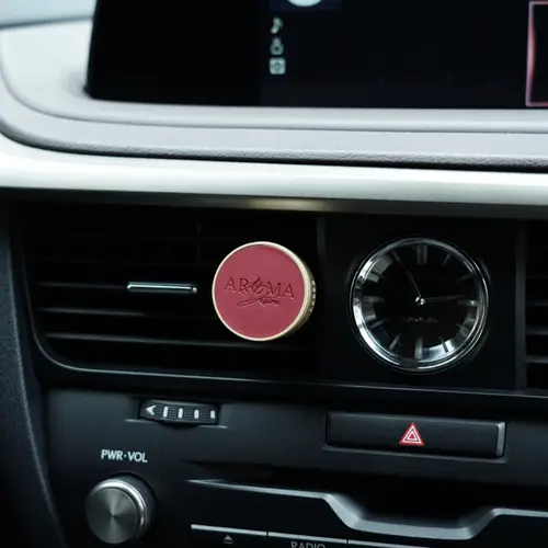Vent clip car air freshener fitted inside a car air vent